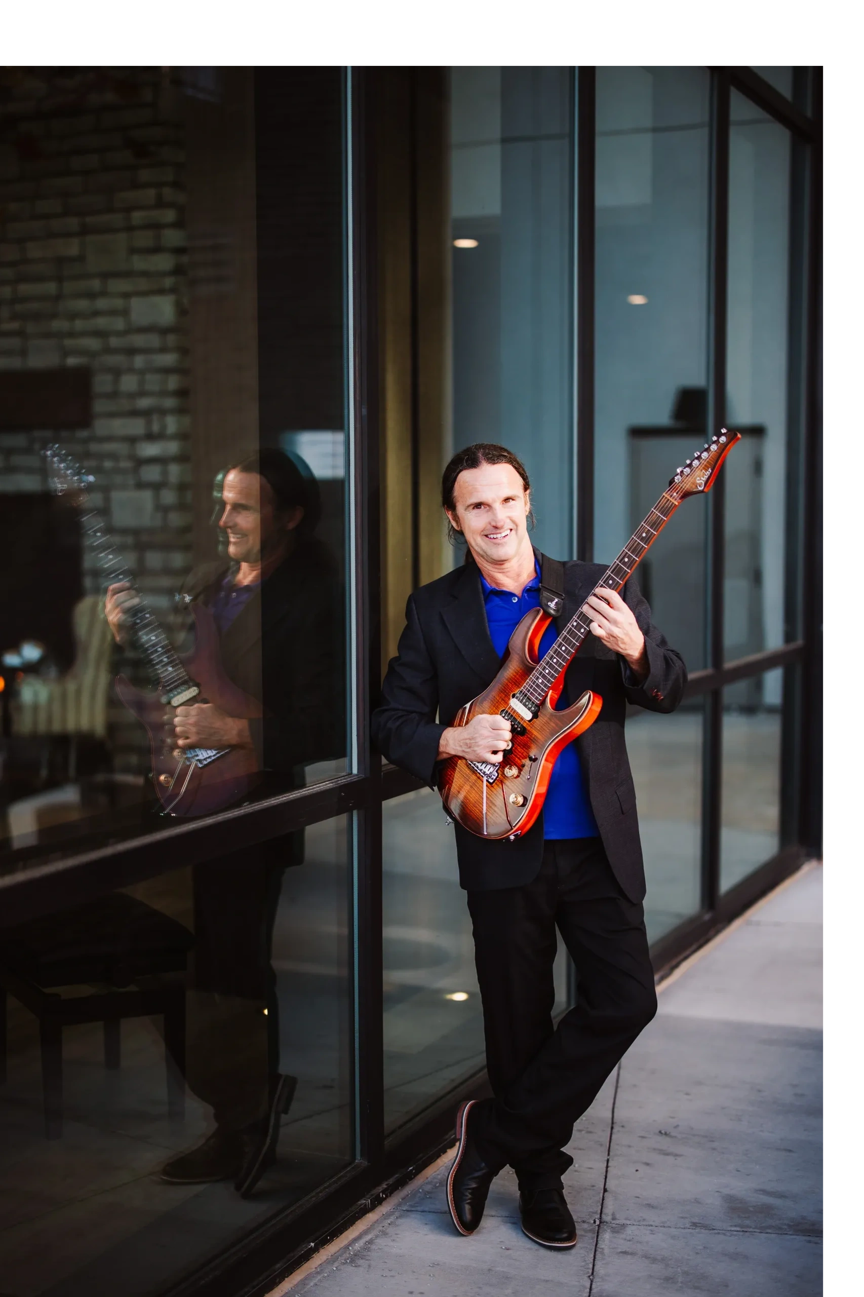 Kenny Kidd professional musician with electric guitar